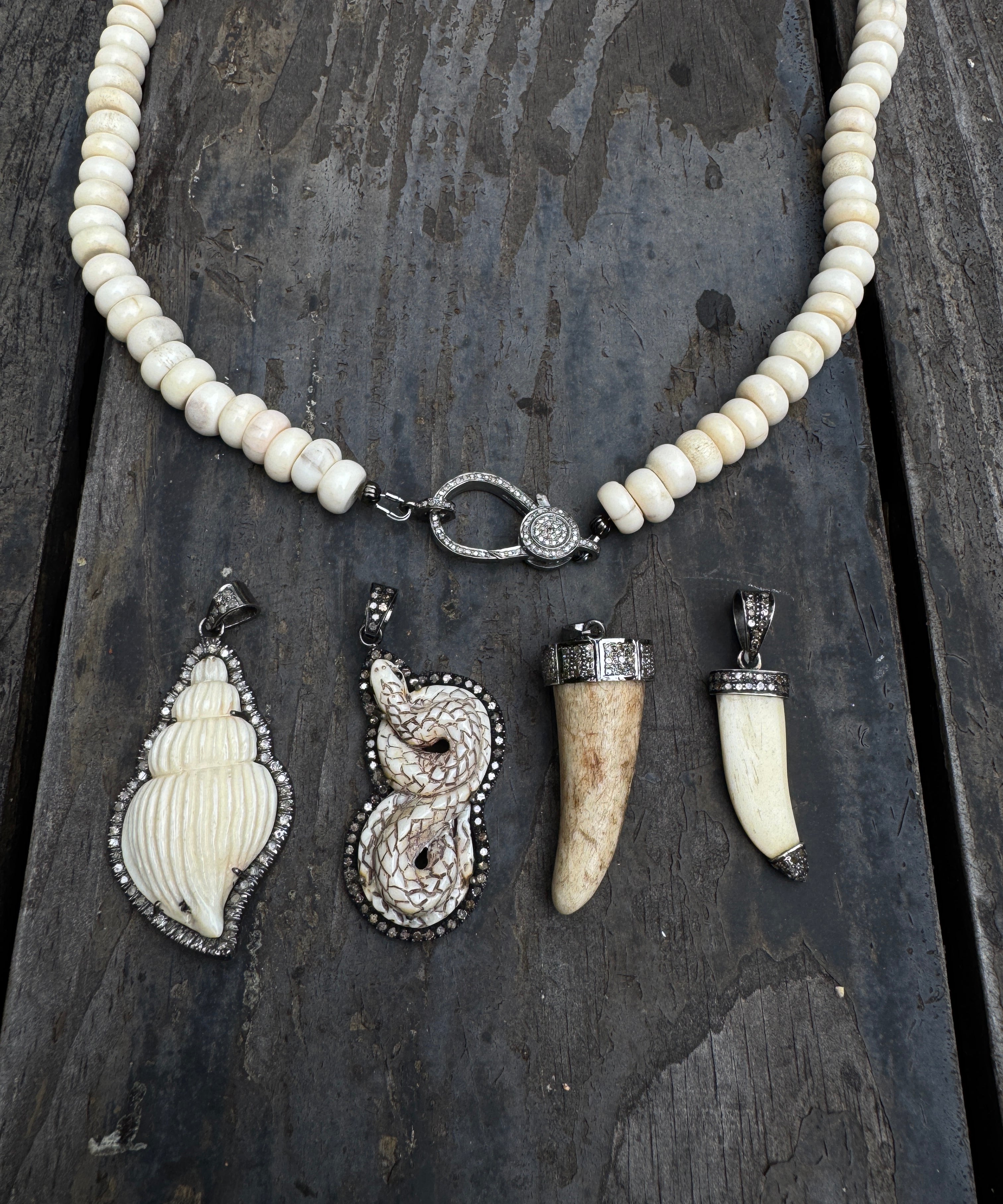 Bone and Diamond Pendants