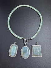 Aquamarine and Diamond Pendants