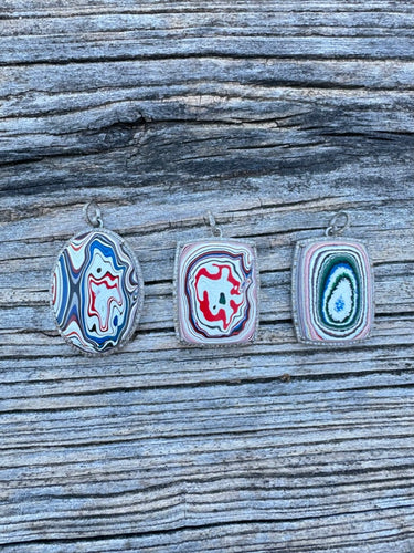 Fordite and Pave Diamond Pendants