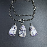Bertrandite and Diamond Pendants