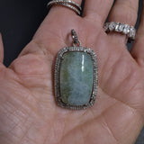 Aquamarine and Diamond Pendants