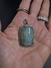 Aquamarine and Diamond Pendants