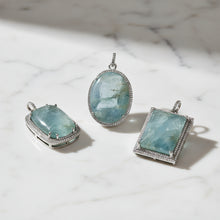 Aquamarine and Diamond Pendants