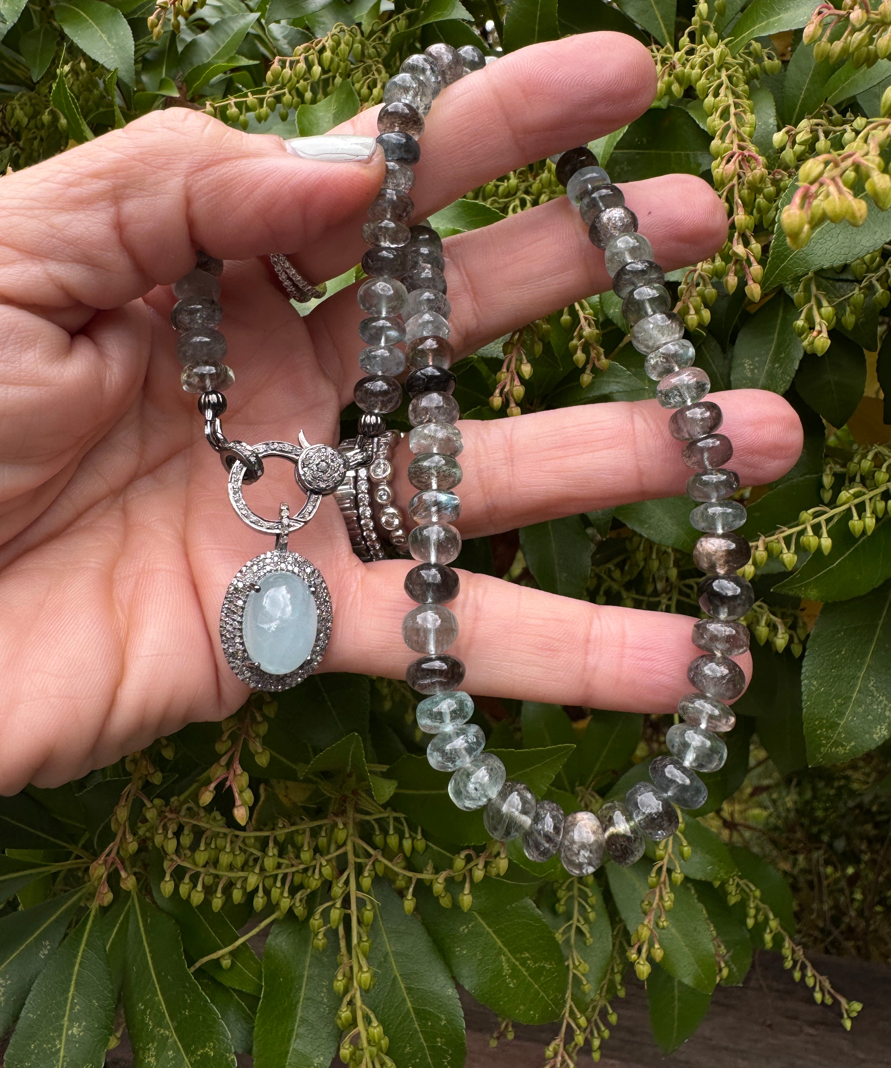 Puffy Aquamarine Oval Pendant with Diamond Border