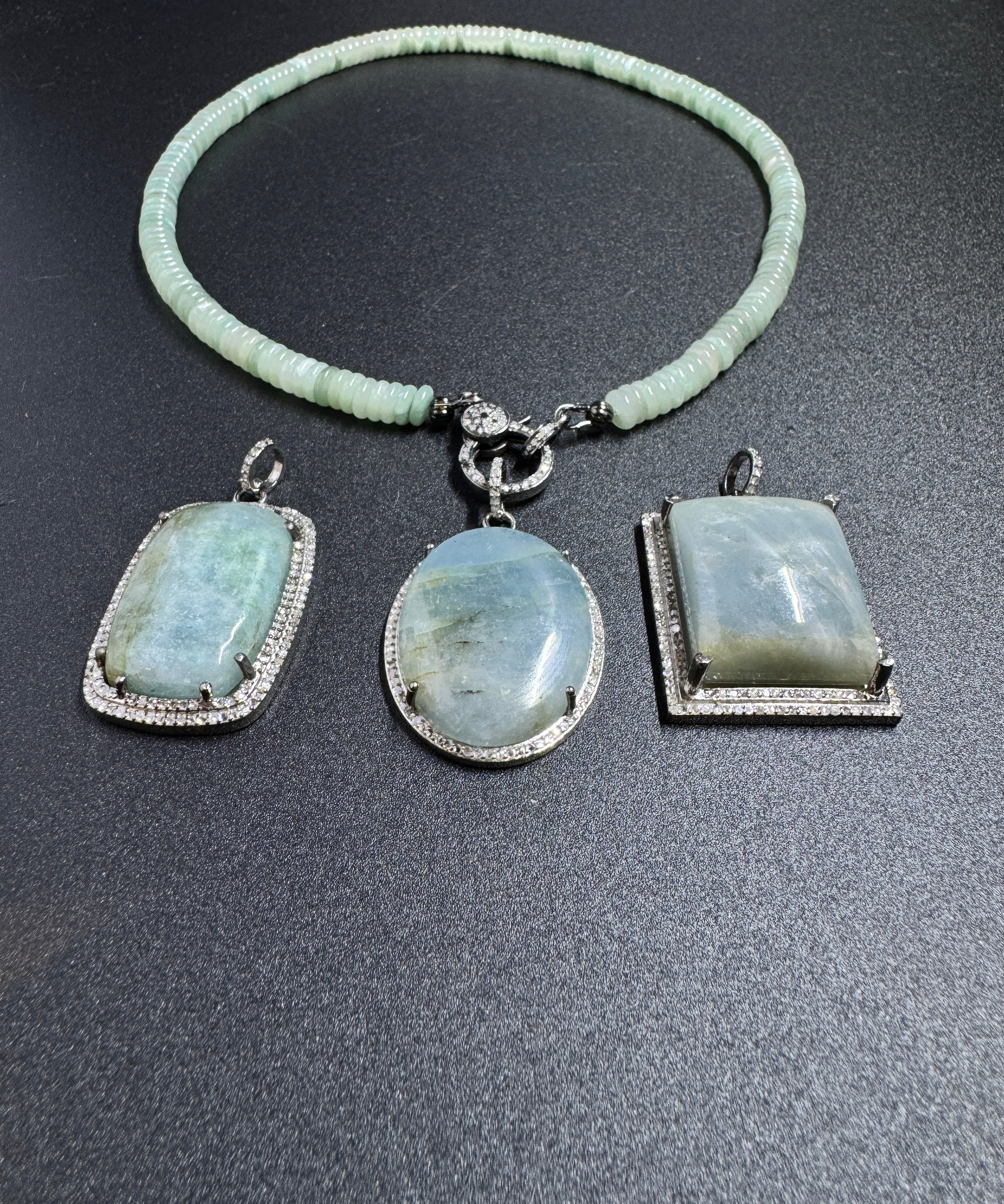 Aquamarine and Diamond Pendants