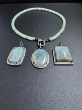 Aquamarine and Diamond Pendants