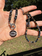 Sterling Silver Disc with Diamond and Sapphire Evil Eye Pendant