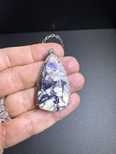 Bertrandite and Diamond Pendants