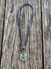 Triple Strand Blue Beaded Necklace with Pave Diamond Clasp. Mother of Pearl, Pave Diamond, and Enamel Evil Eye Pendant
