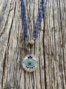 Triple Strand Blue Beaded Necklace with Pave Diamond Clasp. Mother of Pearl, Pave Diamond, and Enamel Evil Eye Pendant