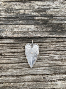 Oblong Heart with Pave Diamond Border and Center Stone Pendant