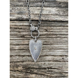Oblong Heart with Pave Diamond Border and Center Stone Pendant