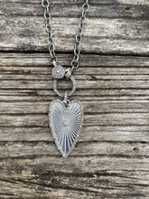 Oblong Heart with Pave Diamond Border and Center Stone Pendant